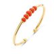 Victoria Gold-colored bracelet with red beads